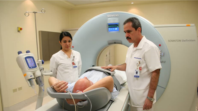 Mexican healthcare professionals treating a patient
