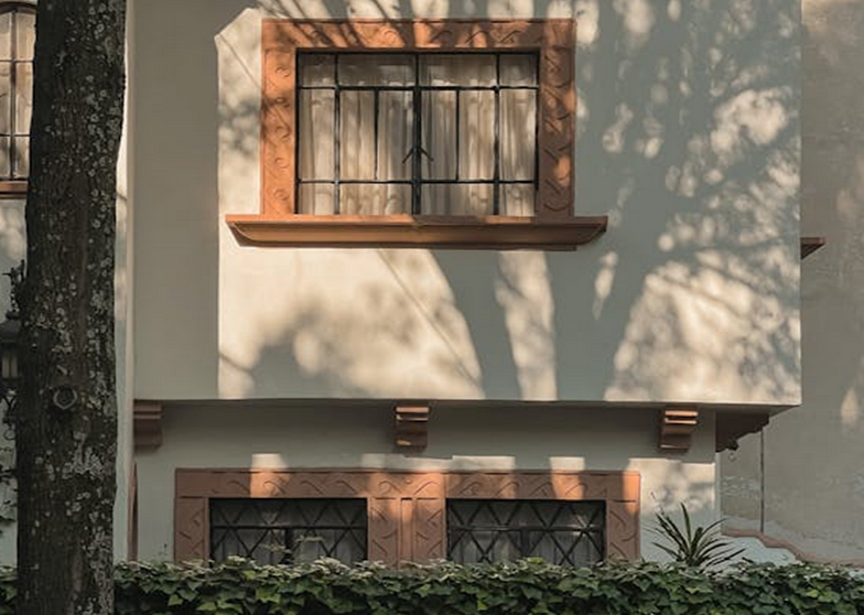Home in Mexico City featuring facade in the colonial style